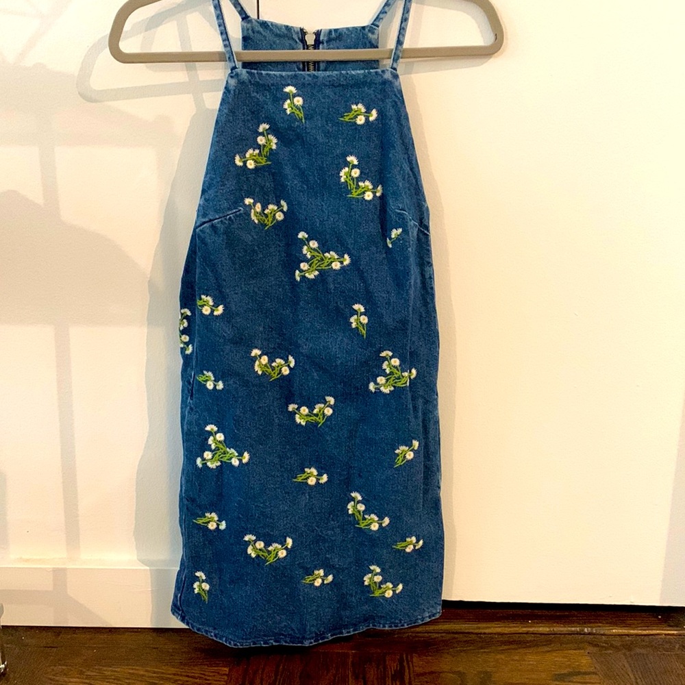 Denim Mini Dress with floral print and pockets.